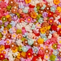 Vista detallada de flores de rosa de resina de 6 mm multicolores para manicura y artesanía - Paquete de 100 / Estilo 08 Flor 6mm