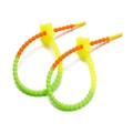 Close-up of star-shaped silicone cable ties with vibrant orange-yellow-green gradient - Fluorescent Green 1