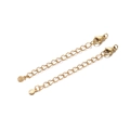 Set of two golden stainless steel 7cm extension chains with lobster clasps and sun pendants - 2 Pcs/Set / Silver Embossed Round Style