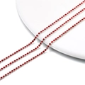 Macro shot of 2mm red crystal rhinestone cup chain with silver metal base on white porcelain - 2.0mm (1m/Pack) / Silver Base Red