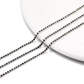 Close-up of black rhinestones in silver claw chains for DIY jewelry making and crafts - 2.0mm (1m/Pack) / Silver Base Transparent Gray