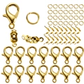 Golden DIY jewelry findings set with lobster clasps, open jump rings and fold-over crimps - 60Pcs Set / Gold