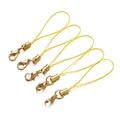 Detail of five yellow mobile lanyards with gold lobster clasps for DIY accessories - Light Yellow
