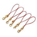 Detail of red nylon lanyards with gold lobster clasps for mobile phone accessories - Red