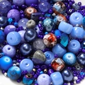 Macro shot of 8mm blue and purple glass beads in mixed textures for DIY jewelry - 20g/Pack (2-8mm) / Deep Blue Series