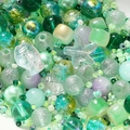 Macro view of green themed DIY jewelry bead mix with pearls and glass starfish charms - 20g/Pack (2-8mm) / Xizi Green