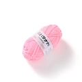 Close-up of pink 4-ply milk cotton yarn roll with white Liliarge label for DIY knitting - Pink