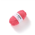 Close-up of pink 4-ply milk cotton yarn roll for crochet crafts on white background - Carmine Pink