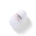 Detailed texture of white 4-ply cotton milk yarn with Hamanaka brand label - White