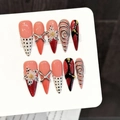 Unghie finte 3D con rose rosa, pois neri e dettagli a spirale metallica - Extra Piccolo (XS)