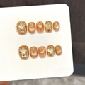 Caramel starburst press-on nails with orange cat eye finish and glitter heart accents - Extra Small (XS) / Caramel Orange Brown (Short Square Round)