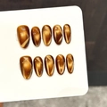 Caramel amber cat-eye press-on nails in oval shape with metallic magnetic luster - Extra Small (XS) / Medium Oval (3459)