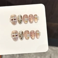 Uñas postizas artesanales cat-eye champán con detalles de león 3D y perlas finas - Extra Pequeño (XS) / Ovalado Corto (3453)