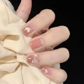 Unghie finte rosa marrone con cuori 3D, perle e un fiocco glitterato decorativo - S
