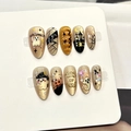 Ongles Halloween avec motifs 3D fantômes et citrouilles sur base champagne effet œil de chat - Style Œil de Chat Citrouille Fantôme Halloween (F565)