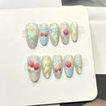 Faux ongles amande longs avec nœuds bleus et motifs floraux 3D, ensemble de 10 pièces - Style Nœud Bleu Paillettes Argent Doux (F566)