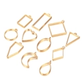 Close-up of golden geometric alloy bezel frames for DIY resin jewelry making - Variety Collection / Gold