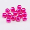 Close-up of bright rose pink pearl beads for DIY jewelry making and crafting - 6mm / Rose Red