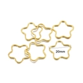 Detailed view of six 20mm golden star-shaped metal frames for DIY resin pendant jewelry - 30Pcs Pack / Gold Flower