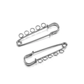 Close-up of two silver metal 5-hole safety pins for DIY jewelry and brooch making - 5-Loop Style / 50mm (10 Pieces/Pack) / Gun Black