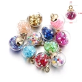 Close-up of 16mm glass ball charms with colorful sequins and golden metal loops - 10 Pieces Pack / Multicolor