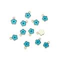 Vista de colgantes de flores azul cielo con borde dorado para creación de joyería DIY - Flor Azul