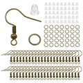 Close-up of antique bronze earring hooks, jump rings, and silicone backings for DIY jewelry - 300pcs / Antique Bronze