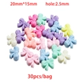 Dettaglio di perline a fiocco in acrilico macaron 20x15mm con foro 2,5mm per gioielli DIY - 01 Perline Miste A Fiocco