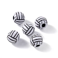 Vue macro de cinq perles de volley-ball rondes avec trous pour la création de bijoux DIY - Black & White Acrylic Volleyball Style