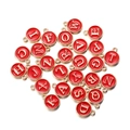 Macro detail of 26 red enamel and gold alloy alphabet charms for DIY jewelry making - Letter A / Red