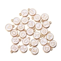Detailed view of white enamel and gold alphabet pendants for DIY jewelry crafting - Letter A / White
