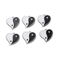 Detail of six heart-shaped yin yang enamel charms in black and white with metal loops - Black & White Tai Chi Heart
