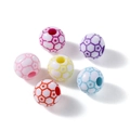 Gros plan de perles de football colorées avec motifs d'étoiles et trous centraux DIY - Perles de Football Colorées