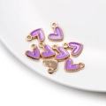 Détails de breloques cœur en émail lilas avec bords dorés pour la création de bijoux - Violet