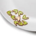 Macro detail of eight heart-shaped enamel charms with gold trim for DIY jewelry - 10 Pieces/Pack (9x10mm) / Green