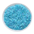 Gros plan de paillettes étoiles bleu clair irisées pour nail art en plateau blanc - Paquet de 4x4mm/10g / Bleu