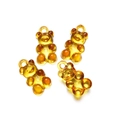 Close-up of four amber transparent resin bear charms for DIY jewelry and hair accessories - 10 Pieces/Pack (12x21mm) / Orange