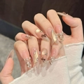 Unghie finte con fiocco marrone, glitter cat eye champagne e decori perla - XS / Ovale Lungo