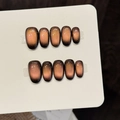 Unghie finte fatte a mano effetto cat-eye marrone sfumato, forma ovale con finitura lucida - Extra Piccolo (XS) / Ritmo di Marrone Stella Soffice (W449-Ovale Corto)