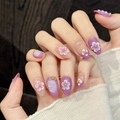 Uñas postizas violetas hechas a mano con flores 3D y perlas de estilo dulce - XS / Almendra Corta