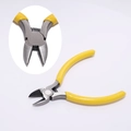 Detail of yellow wire cutters with sharp steel blades and spring mechanism for DIY crafts - Diagonal Cutting Pliers