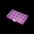 Macro view of a 15-grid pink translucent plastic storage box with secure white buckle - Light Purple