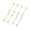 Macro view of eight golden metal double-eye pins for DIY jewelry making accessories - 15mm / KC Gold