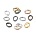 Assorted oval metal jump rings in gold and silver finishes for DIY jewelry making - Multicolor