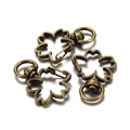 Macro detail of three bronze cherry blossom lobster clasps with rotating D-rings - Flower / Set of 3 / Antique Bronze