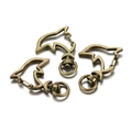 Detail of dolphin-shaped lobster clasps in antique bronze metal with rotating ring - Dolphin / Set of 3 / Antique Bronze