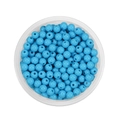 Detailed top view of 6mm bright blue acrylic beads in a transparent container for DIY crafts - Blue