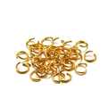 Close-up of bulk gold-colored aluminum open jump rings for DIY jewelry making accessories - 0.8*6mm / Gold