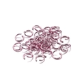 Detailed view of pink aluminum jump rings for DIY jewelry making and bracelet assembly - 0.8*6mm / Light Pink