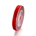 Détail du cordon élastique rouge en cristal sur bobine pour création de bijoux DIY - 50m Par Bobine / Rouge
